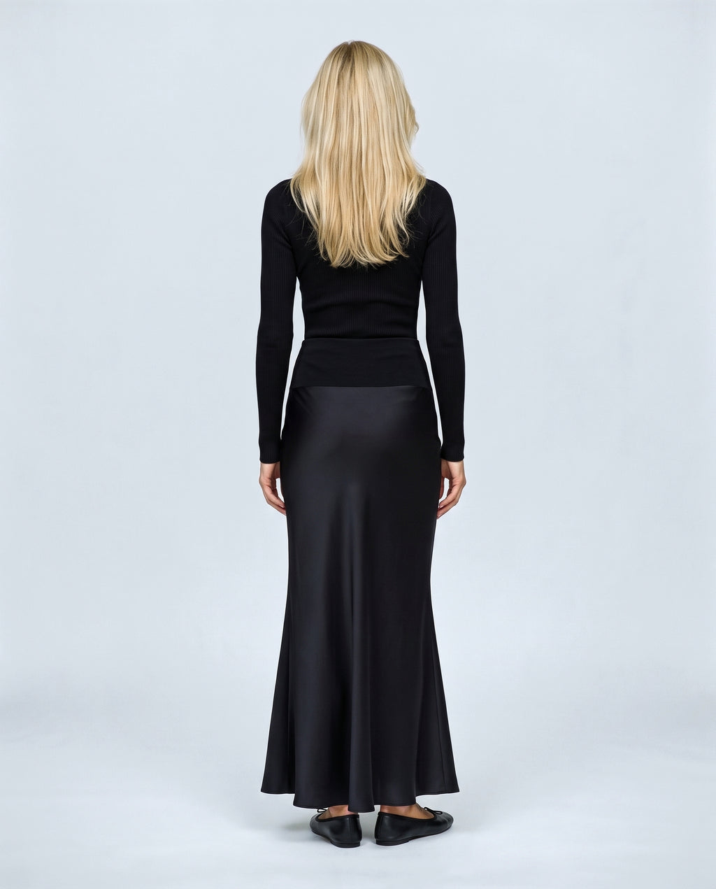 Celeste Satin-Finish Maternity Skirt in Black, back view on a non-pregnant model