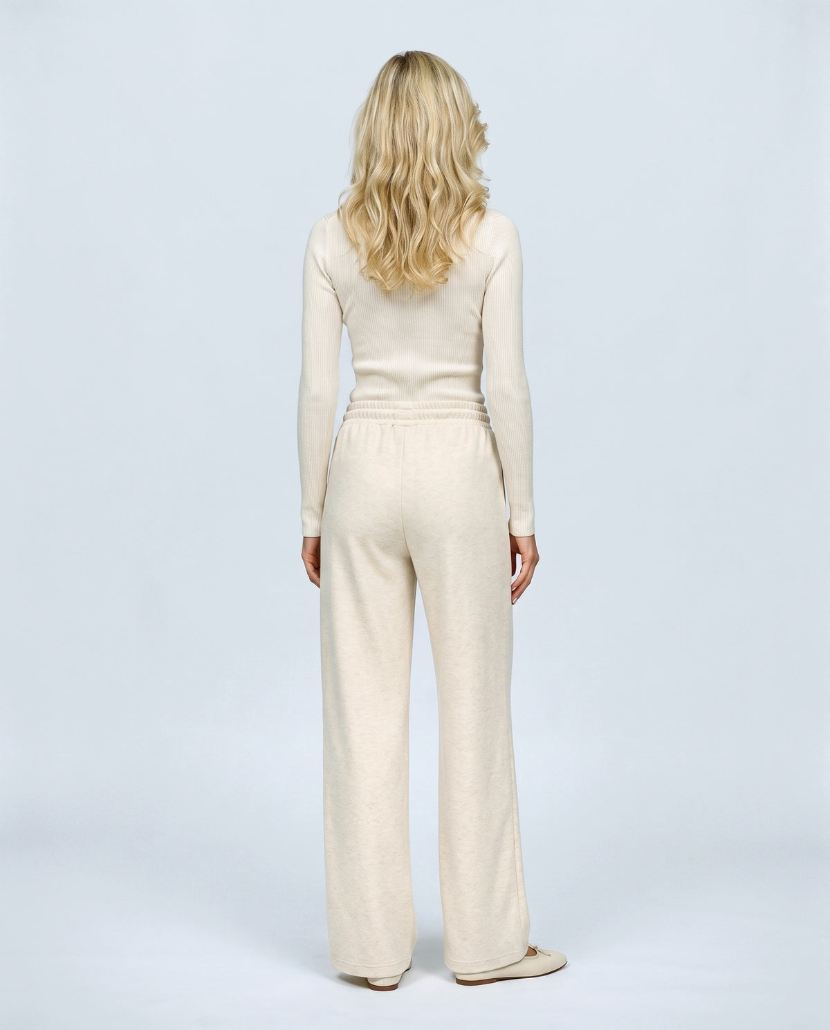 Lena Wide-Leg Maternity Trousers in Almond, back view on a non-pregnant model
