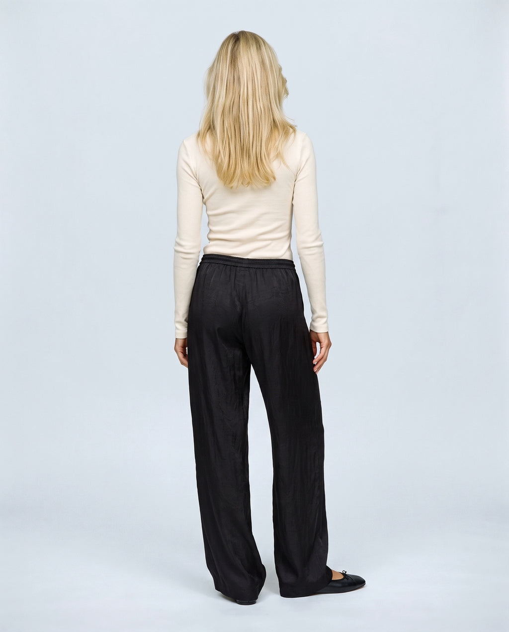 The Draped Maternity Trousers in Black, back view on a non-pregnant model
