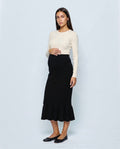 The Maternity Fluted Knit Skirt in Black, front view
