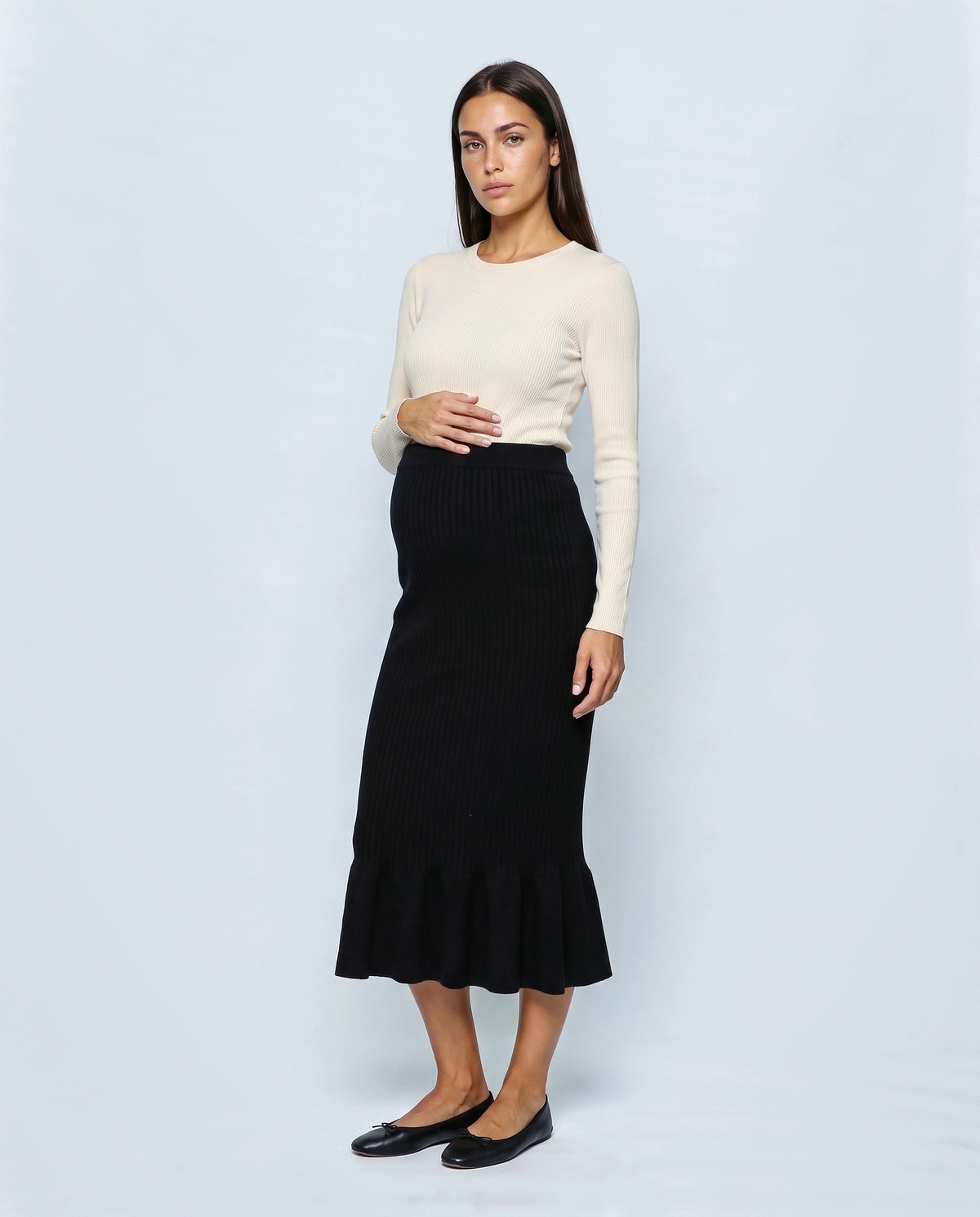The Maternity Fluted Knit Skirt in Black, front view