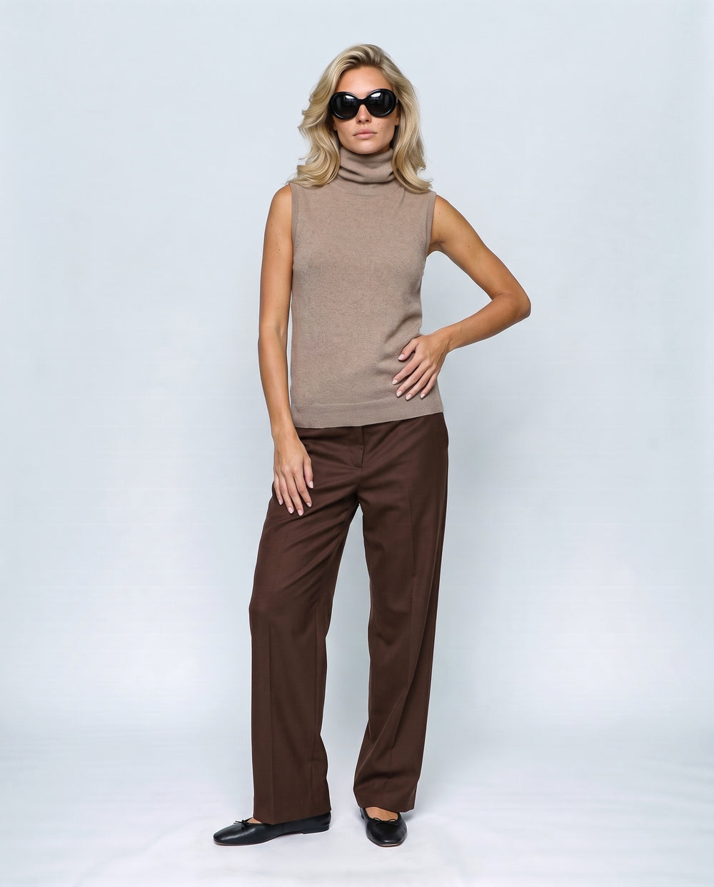 The Sleeveless Roll-Neck in Camel taupe, front view on a non-pregnant model