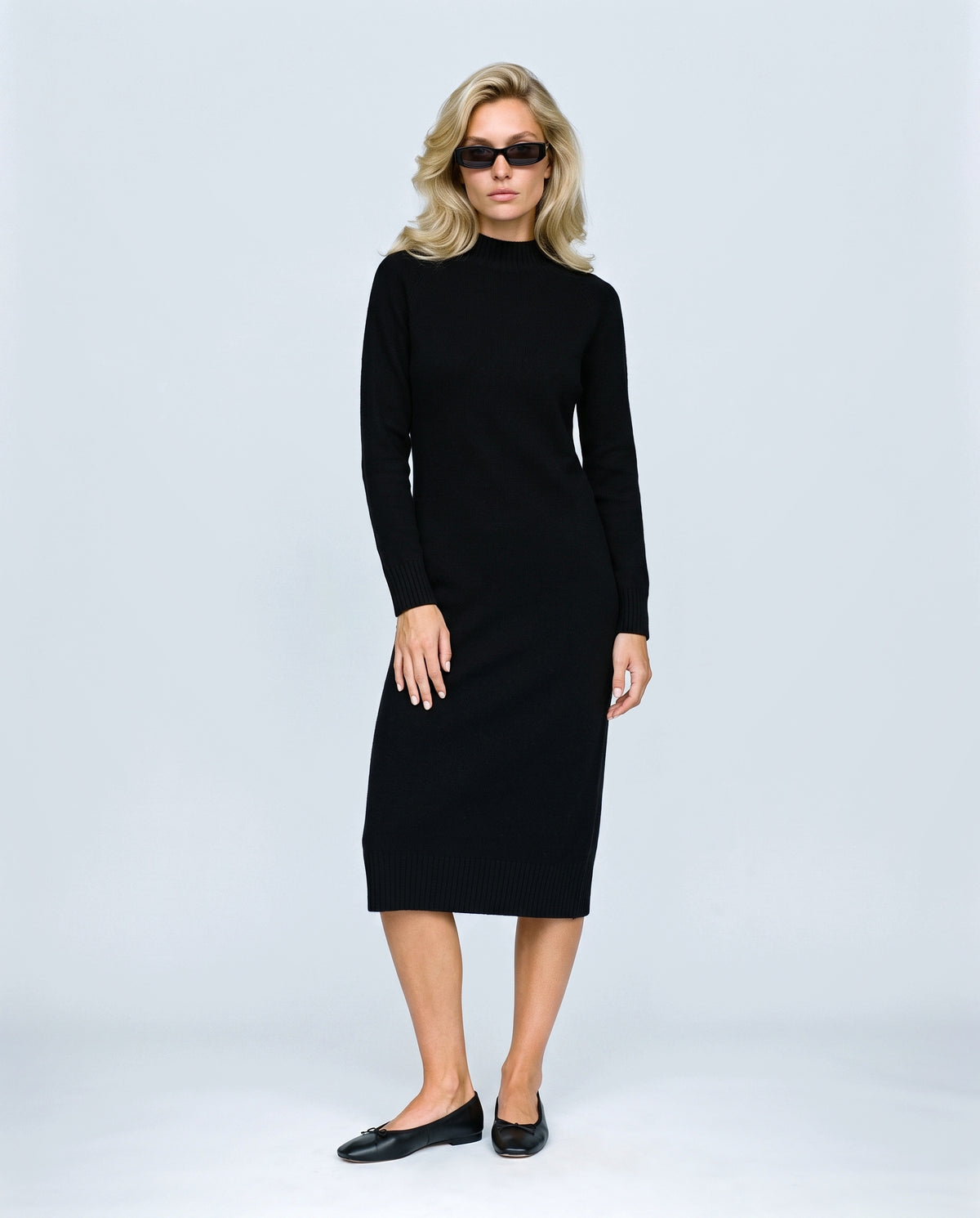 Alice Mock-Neck Knit Dress in Black, front view on a non-pregnant model