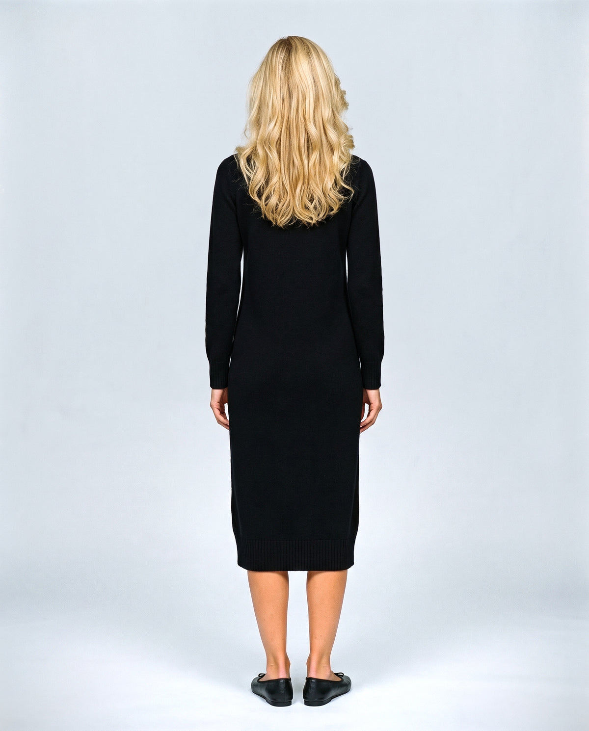 Alice Mock-Neck Knit Dress in Black, back view on a non-pregnant model