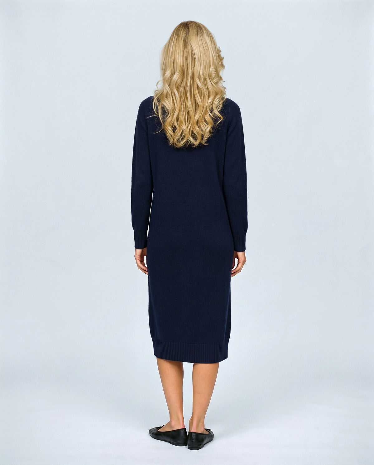 Alice Mock-Neck Knit Dress in Navy, back view on a non-pregnant model