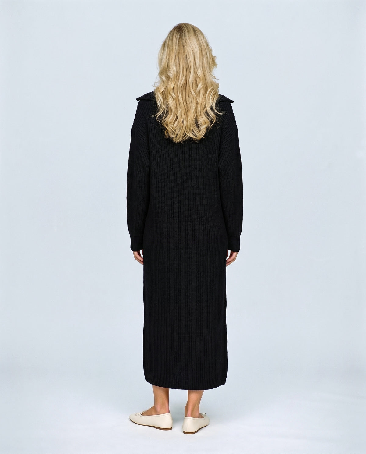 Gabrielle Zip-Neck Knit Dress in Black, back view on a non-pregnant model