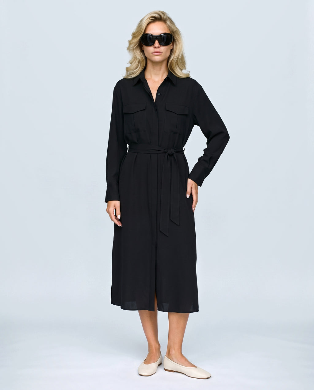 The Belted Utility Shirt Dress in Black, front view on a non-pregnant model