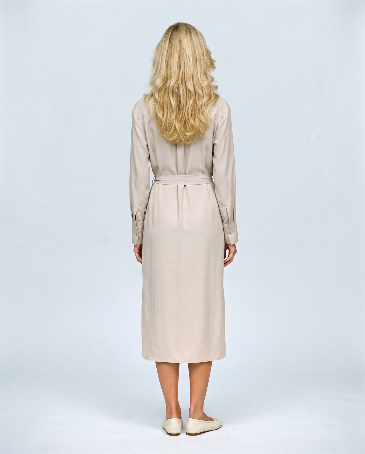The Belted Utility Shirt Dress in Milk beige, back view on a non-pregnant model