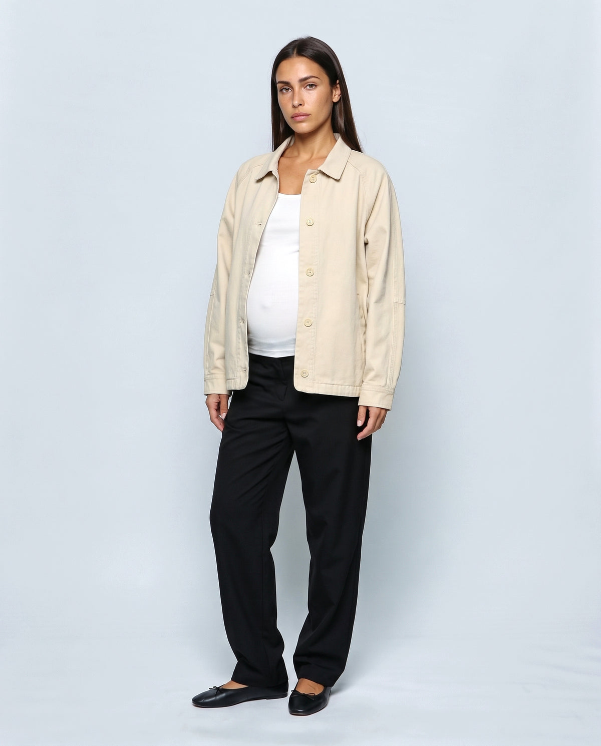 The Relaxed Utility Jacket in Beige, closed over the bump
