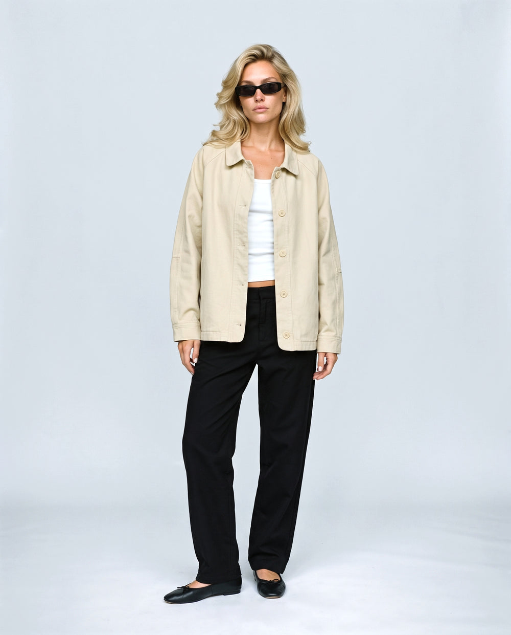 The Relaxed Utility Jacket in Beige, front view on a non-pregnant model