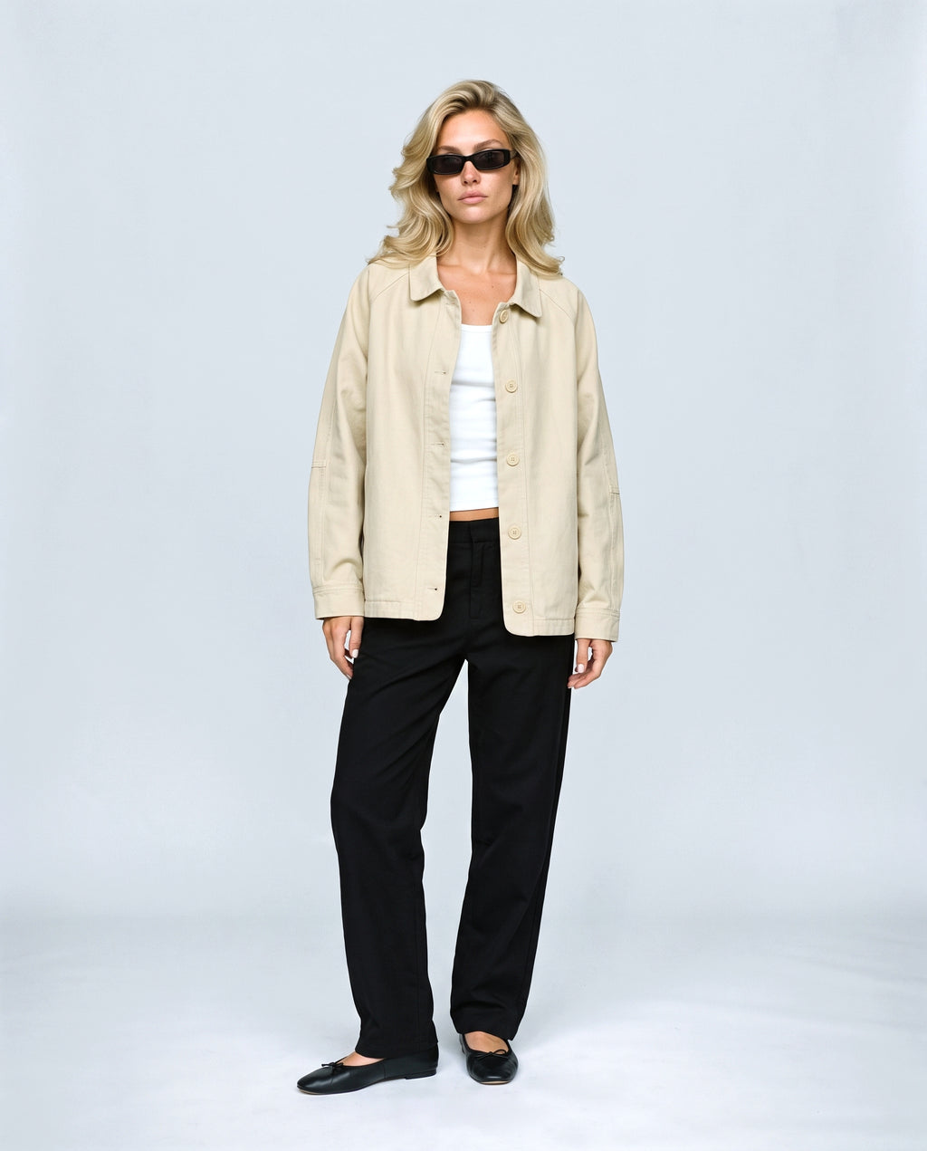 The Relaxed Utility Jacket in Beige, front view on a non-pregnant model