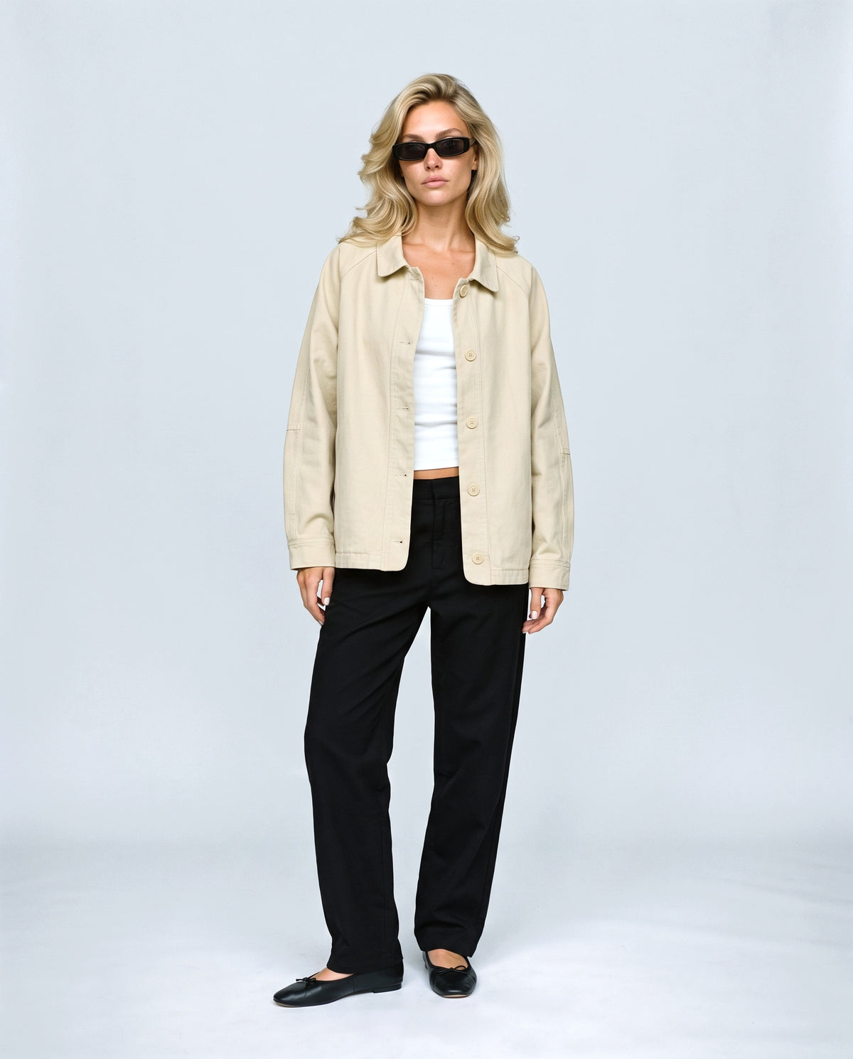 The Relaxed Utility Jacket in Beige, front view on a non-pregnant model