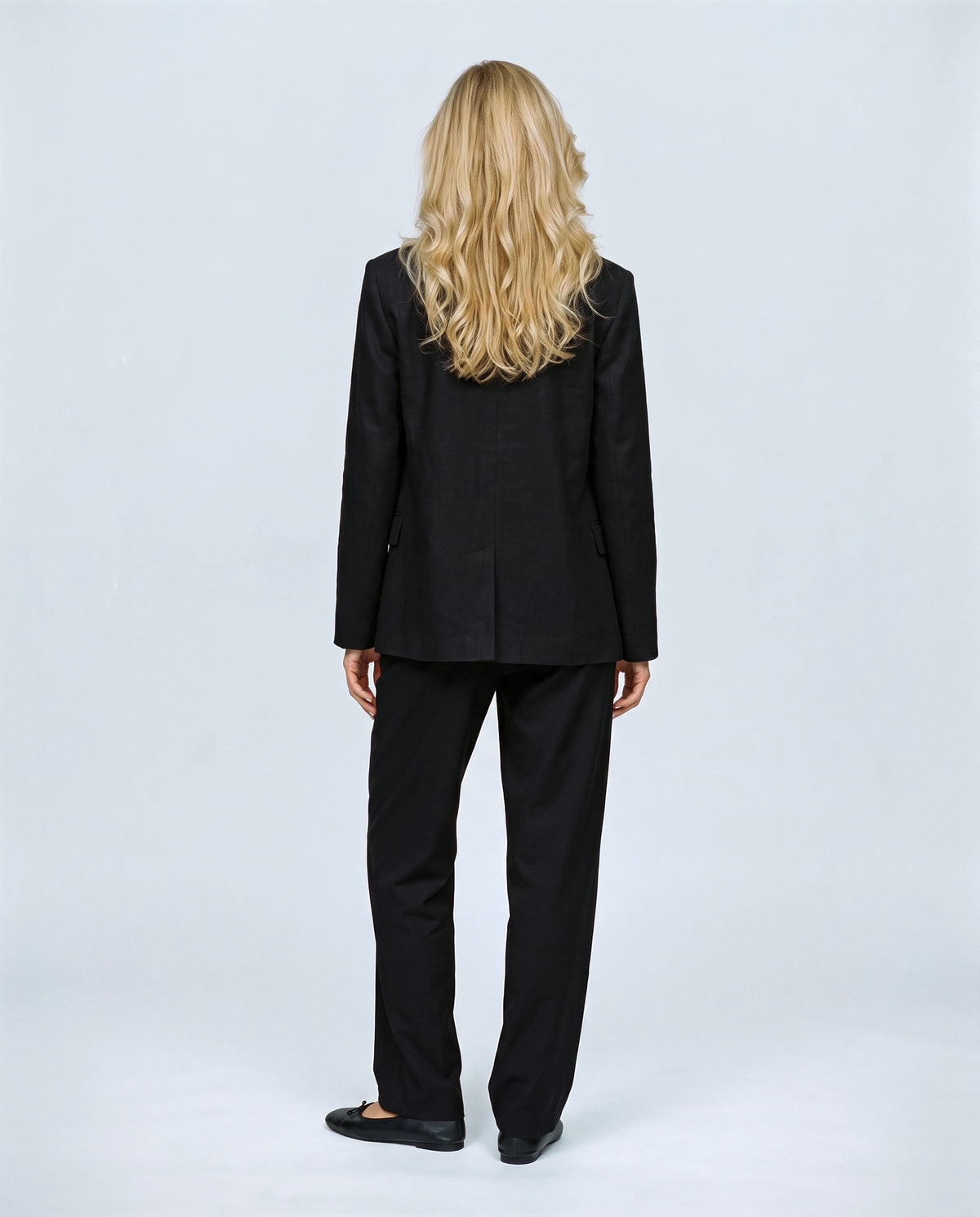 The Stand-Collar Checked Jacket in Black, back view on a non-pregnant model