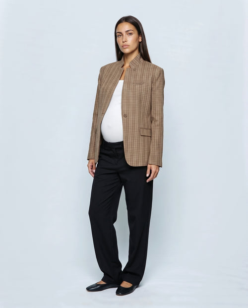 The Stand-Collar Checked Jacket in Brown check, closed over the bump