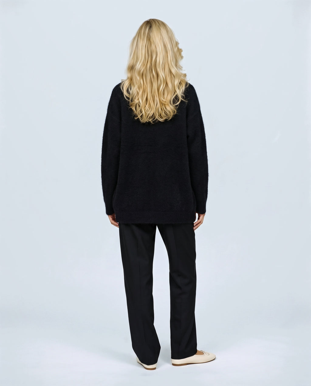 Anais Longline Button Cardigan in Black, back view on a non-pregnant model