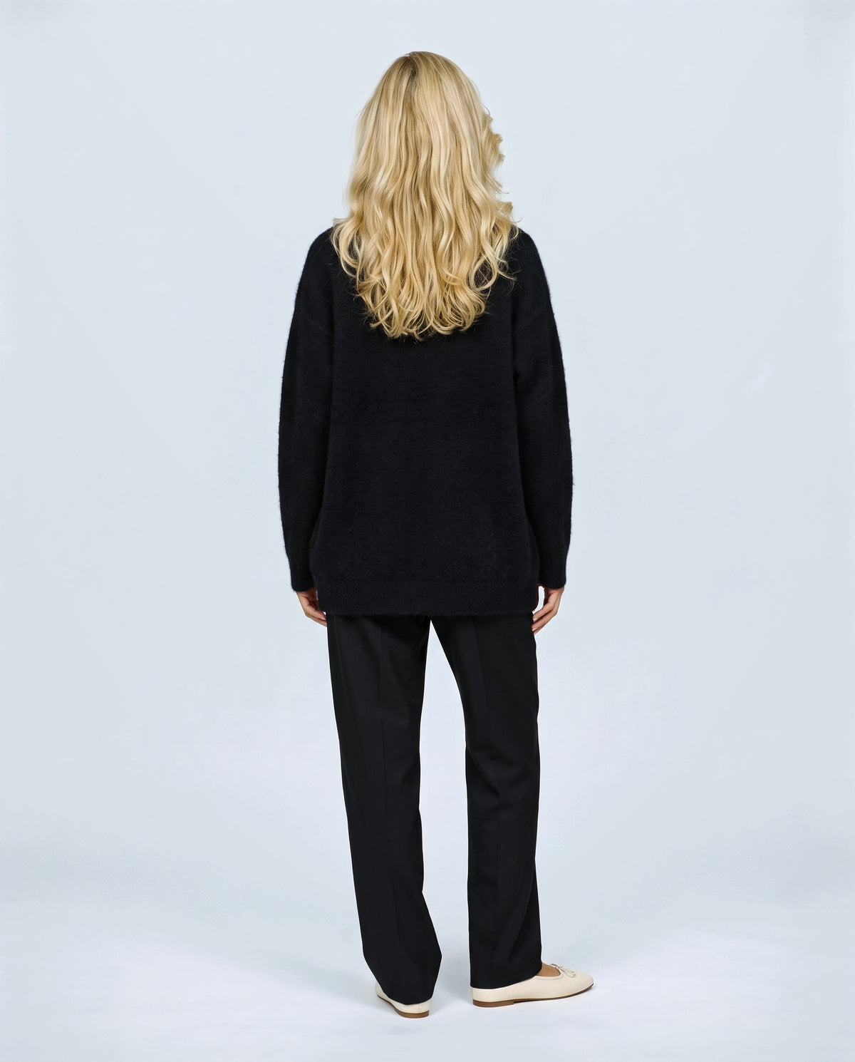 Anais Longline Button Cardigan in Black, back view on a non-pregnant model