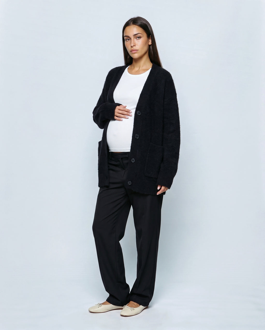 The Deep-V Cardigan in Black, front view