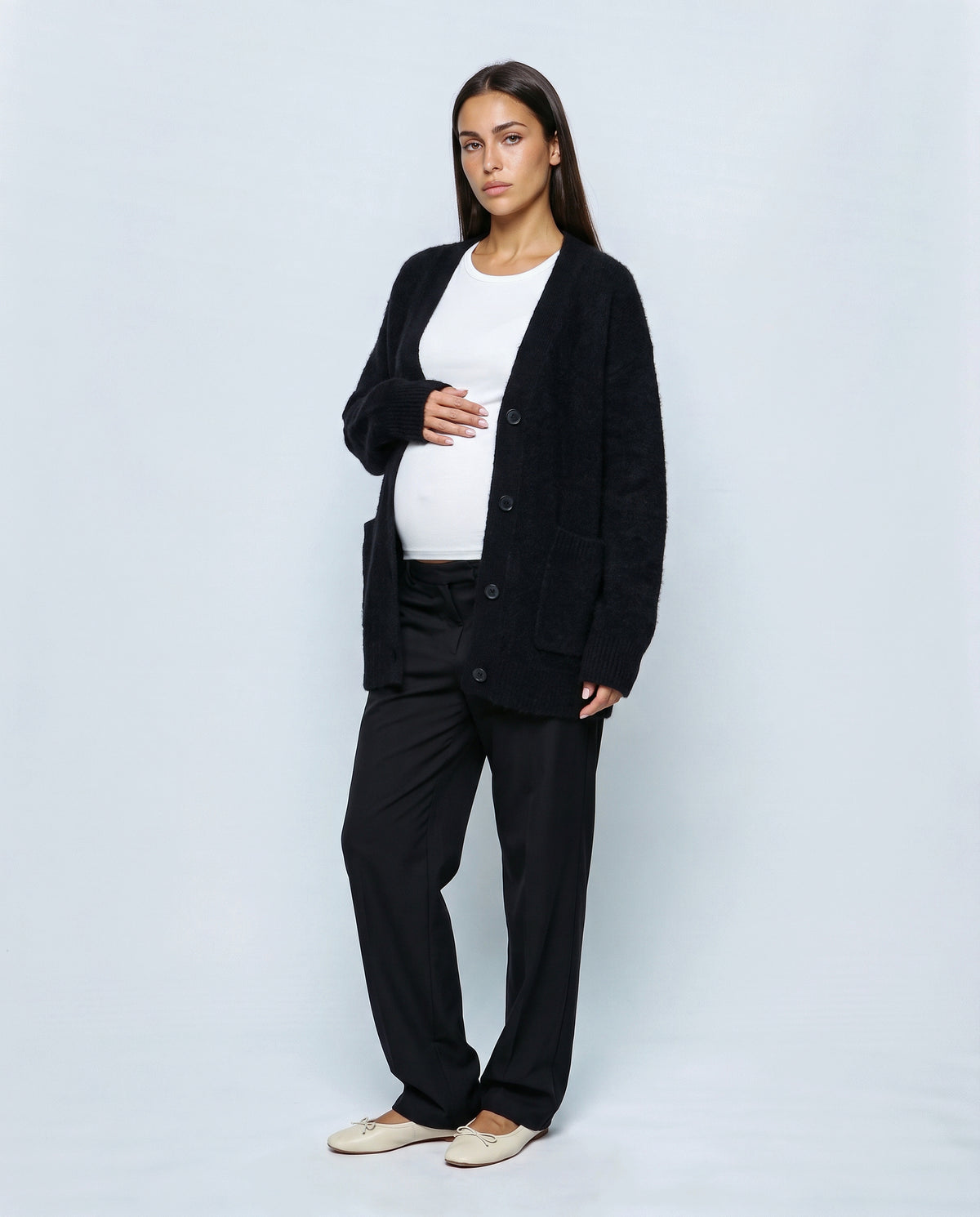The Deep-V Cardigan in Black, front view
