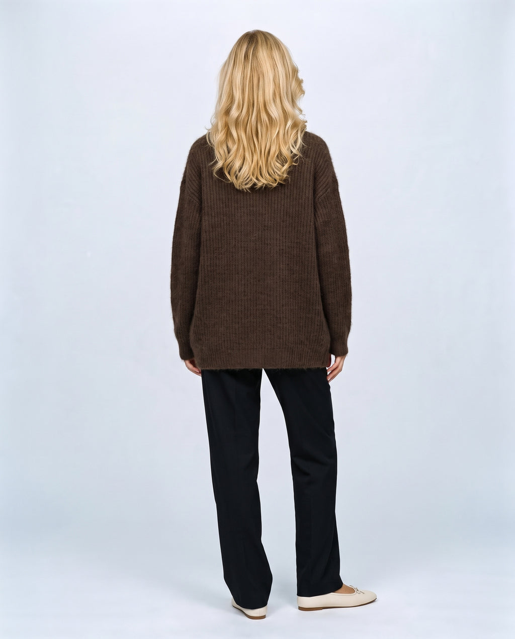 The Deep-V Cardigan in Brown, back view on a non-pregnant model
