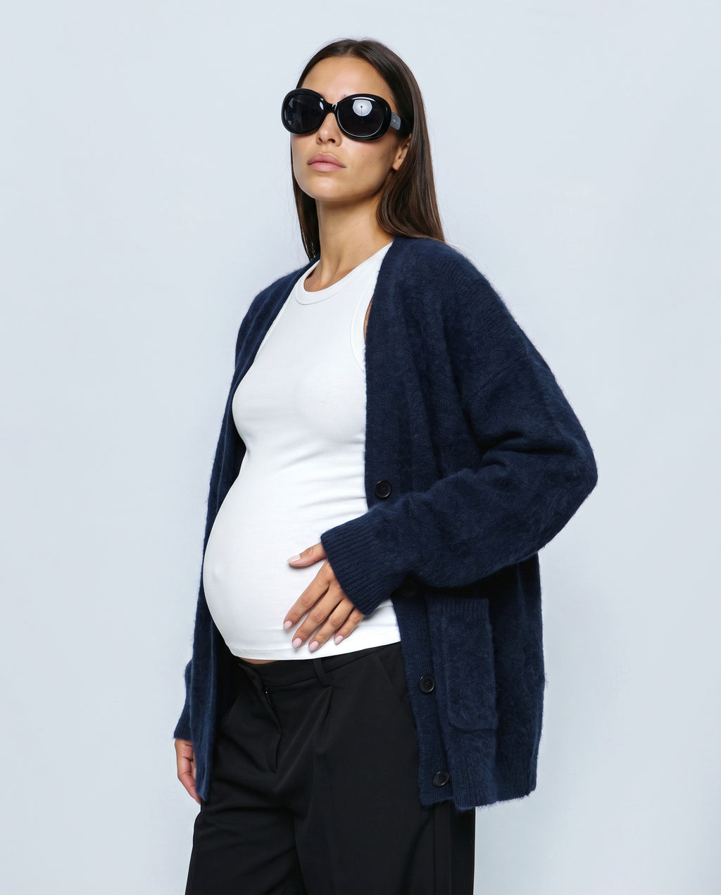 The Deep-V Cardigan in Navy, side view