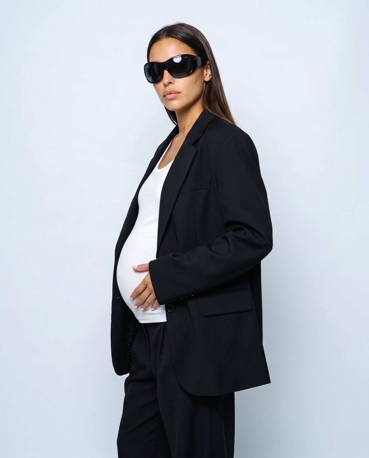 The Relaxed Pinstripe Blazer in Black, side view