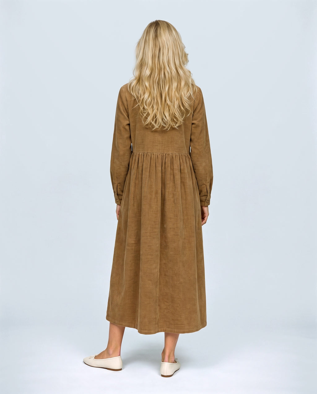 The Corduroy Shirt Dress in Camel, back view on a non-pregnant model