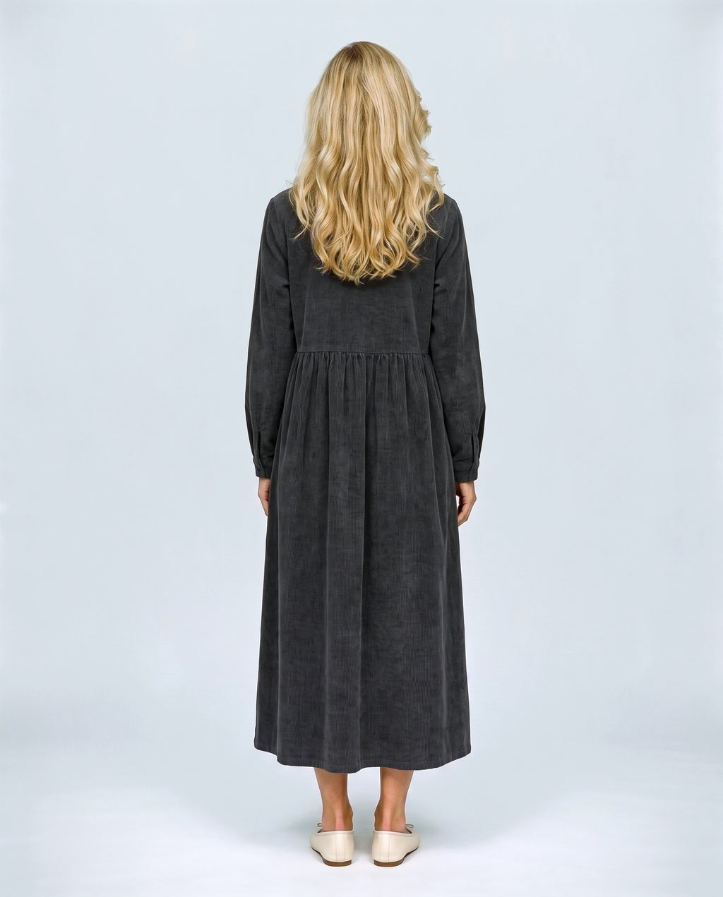 The Corduroy Shirt Dress in Charcoal, back view on a non-pregnant model