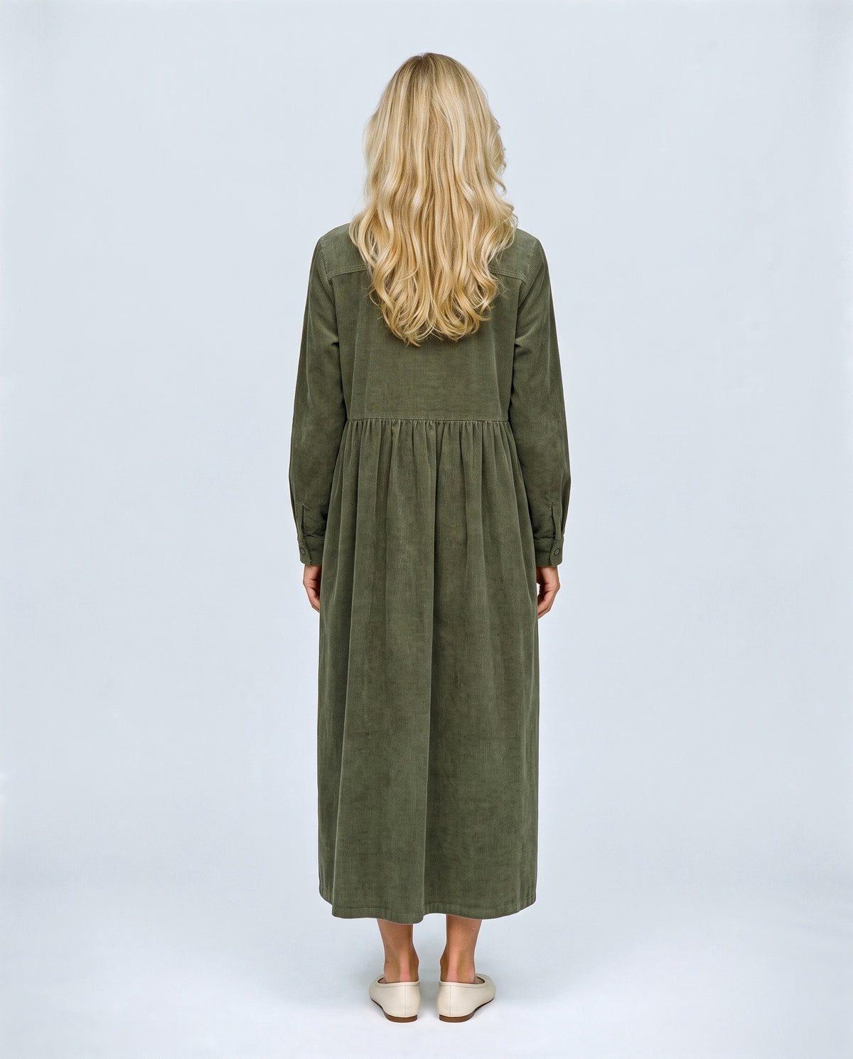 The Corduroy Shirt Dress in Olive, back view on a non-pregnant model