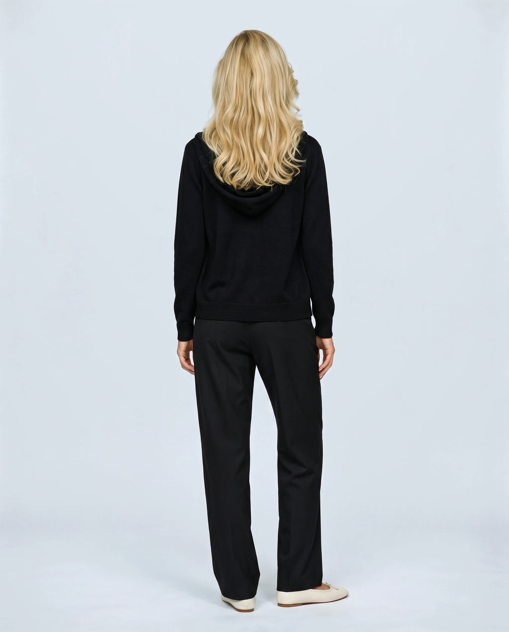 The Everyday Hooded Cardigan in Black, back view on a non-pregnant model