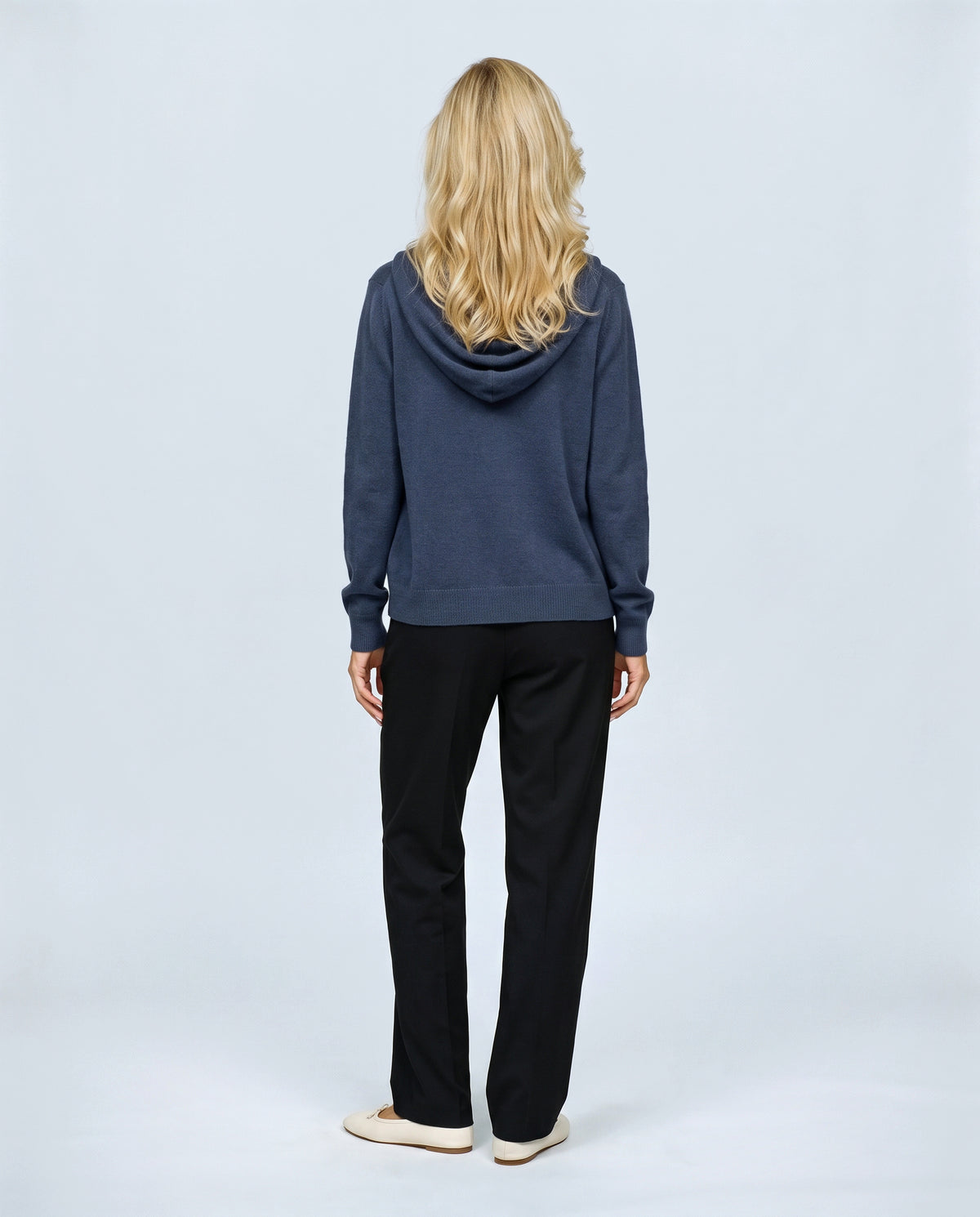 The Everyday Hooded Cardigan in Navy, back view on a non-pregnant model