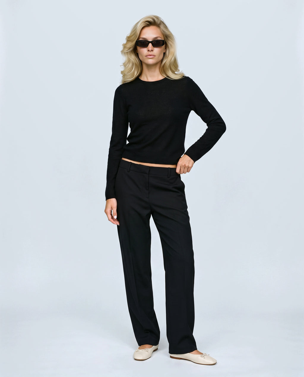 The Refined Crewneck Knit in Black, front view on a non-pregnant model