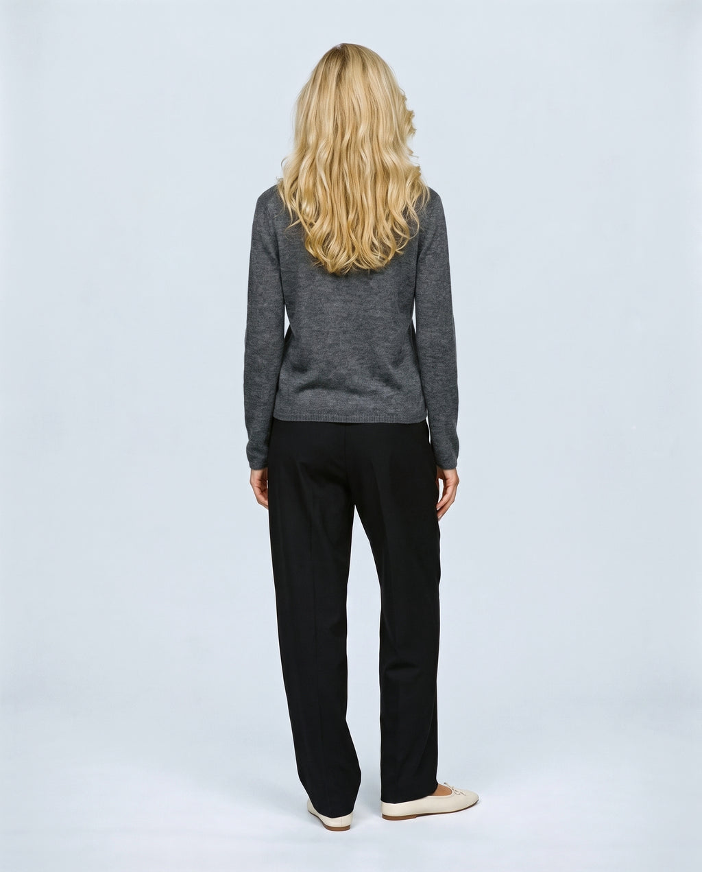 The Refined Crewneck Knit in Grey, back view on a non-pregnant model