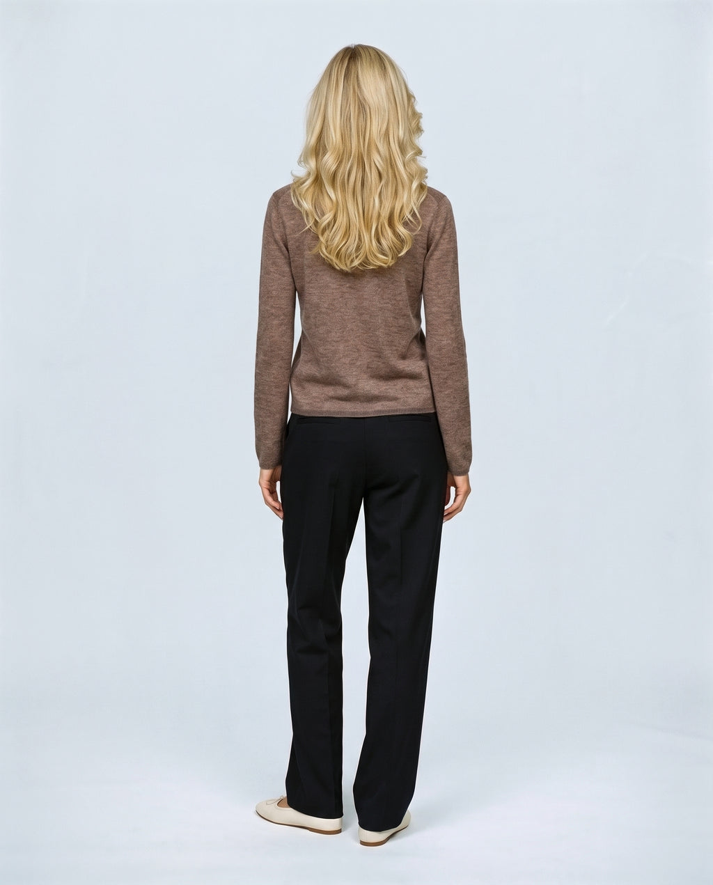 The Refined Crewneck Knit in Wheat, back view on a non-pregnant model