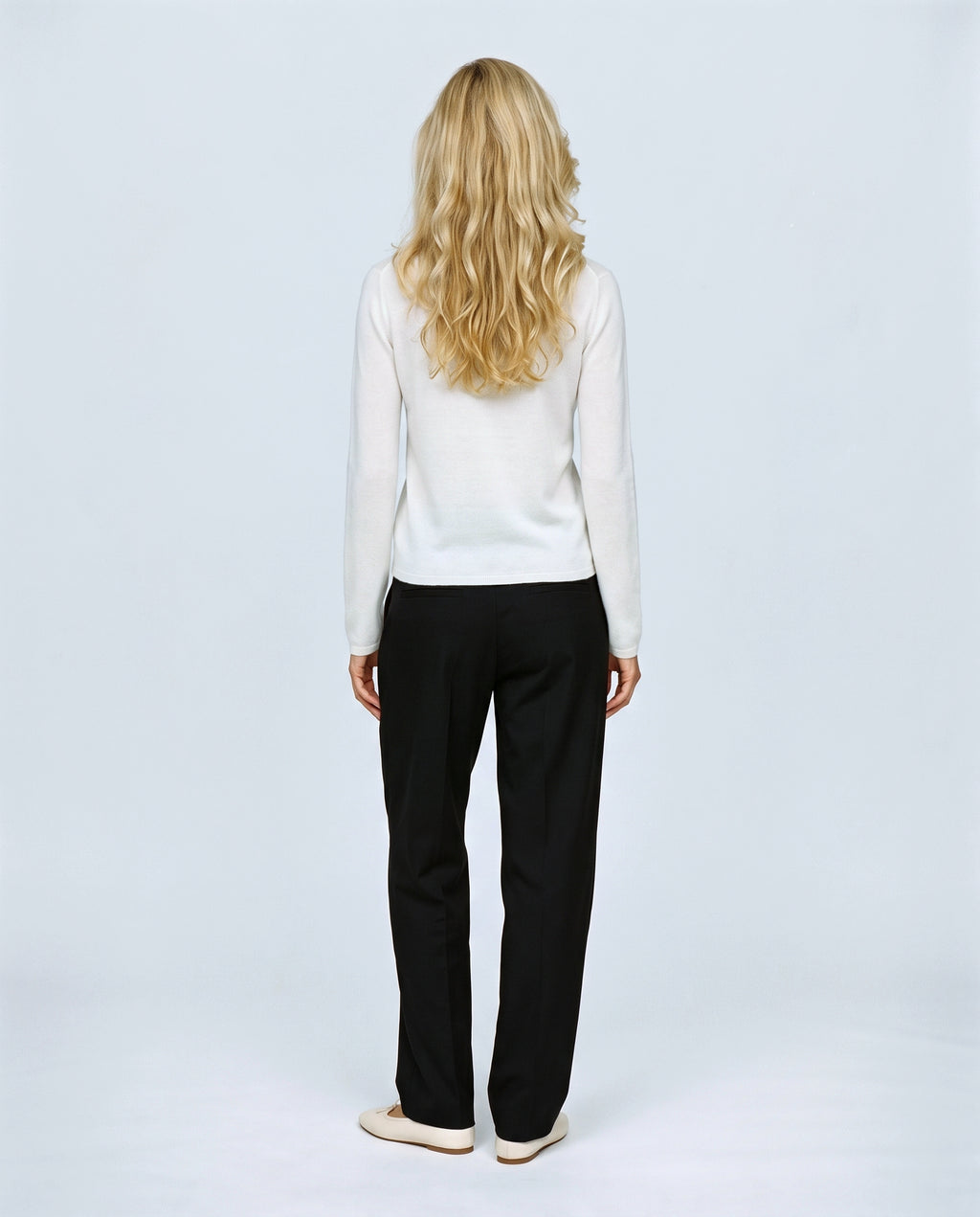 The Refined Crewneck Knit in White, back view on a non-pregnant model