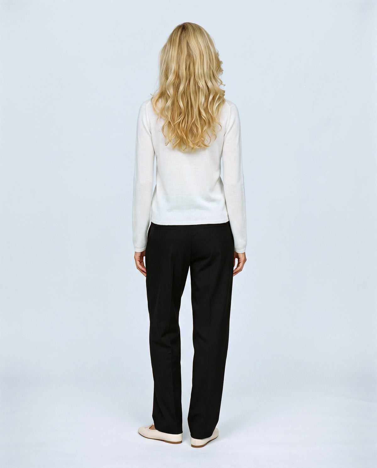 The Refined Crewneck Knit in White, back view on a non-pregnant model
