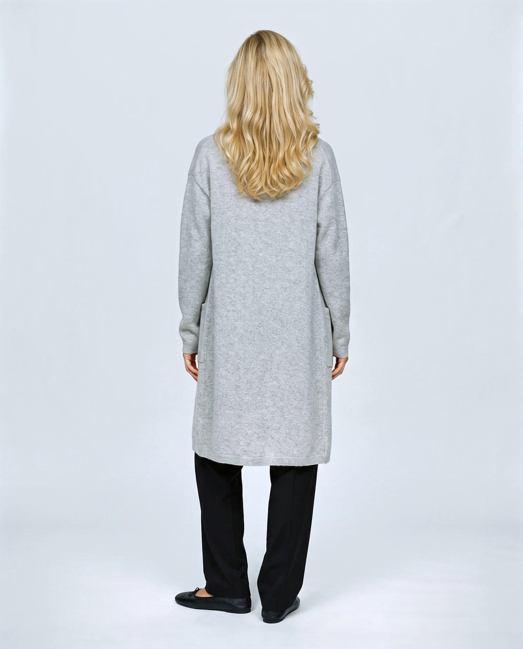 The Open-Front Longline Cardigan in Grey, back view on a non-pregnant model