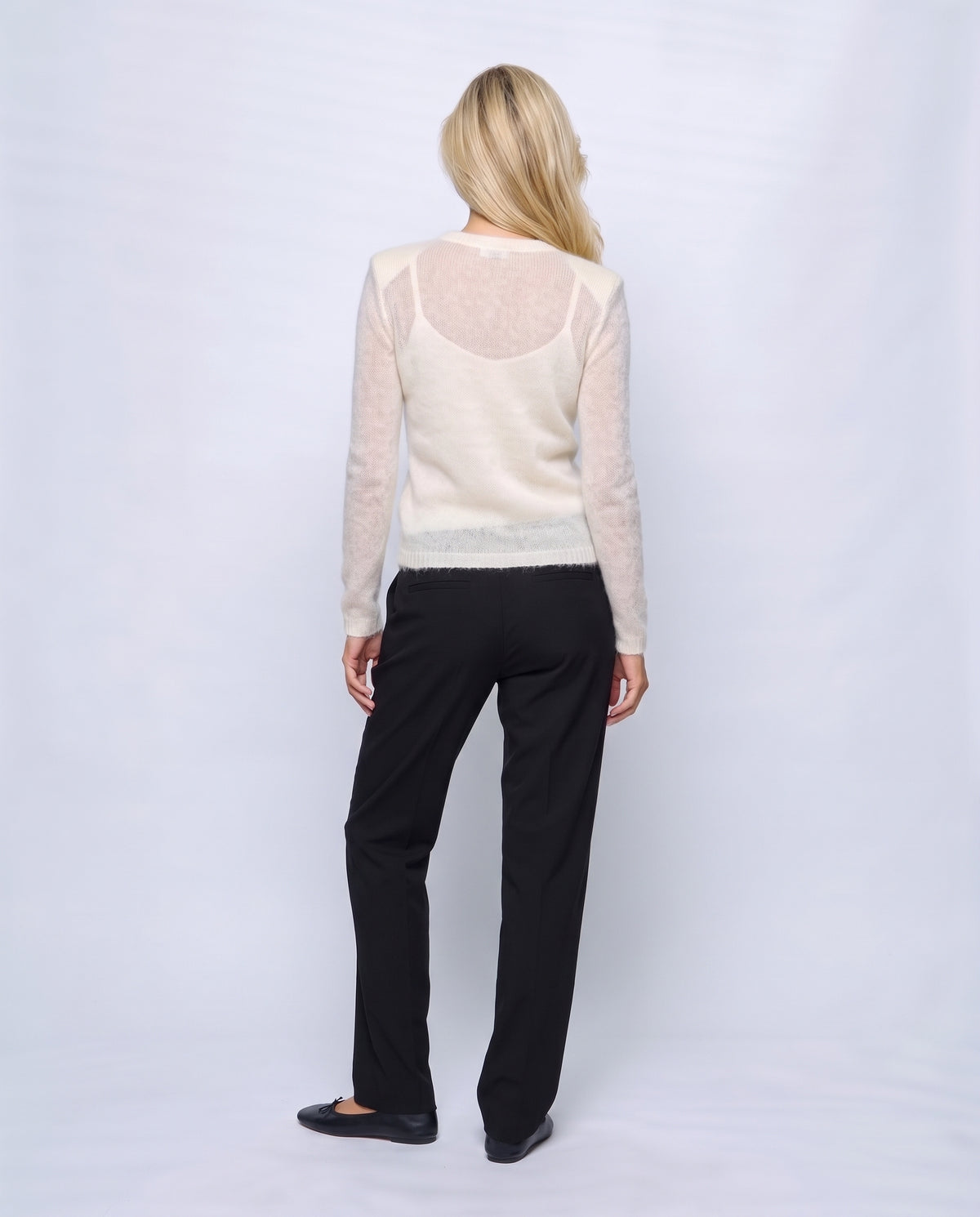 The Fine-Knit Crewneck in Cream white, back view on a non-pregnant model