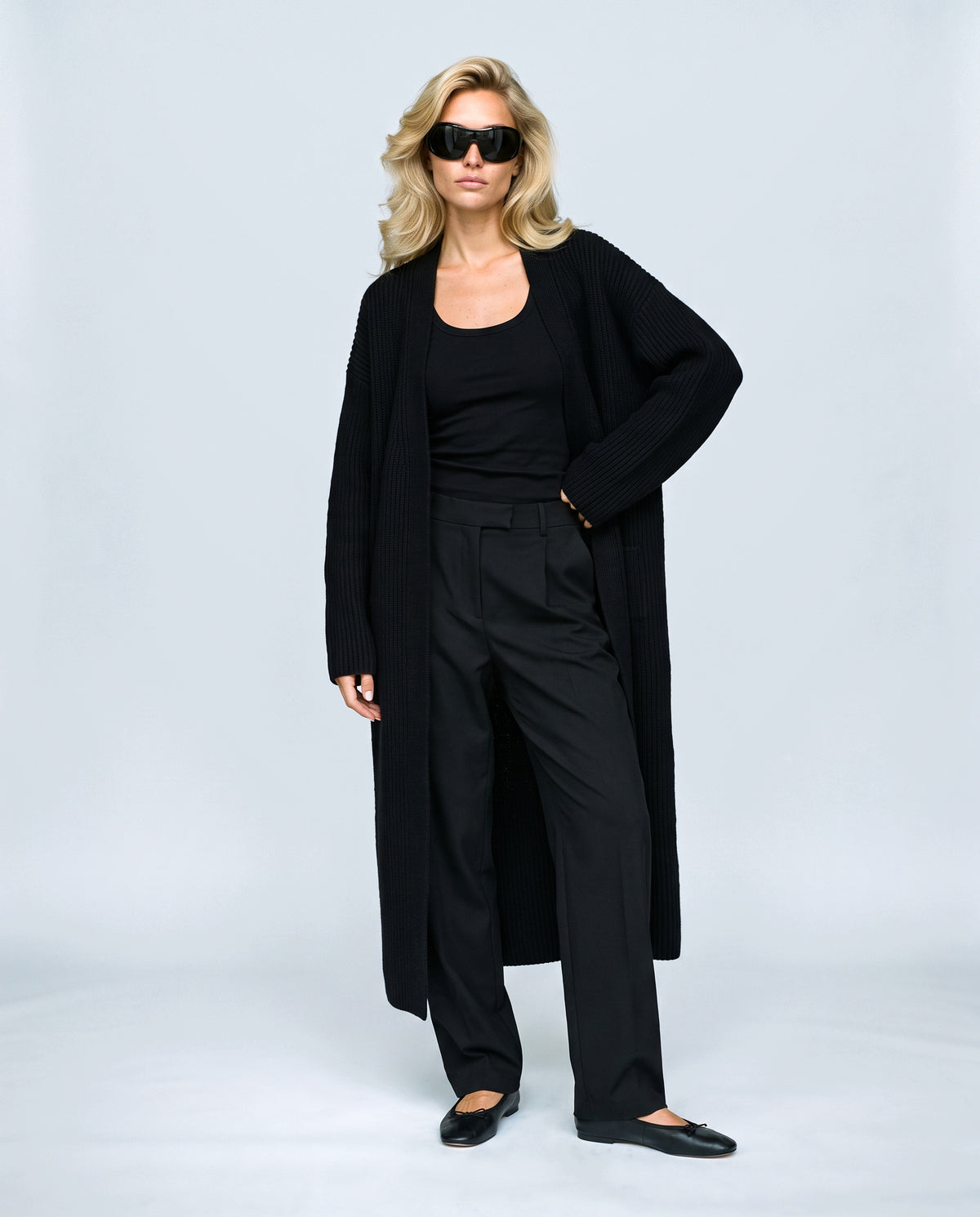 Simone Longline Knit Cardigan in Black, front view on a non-pregnant model