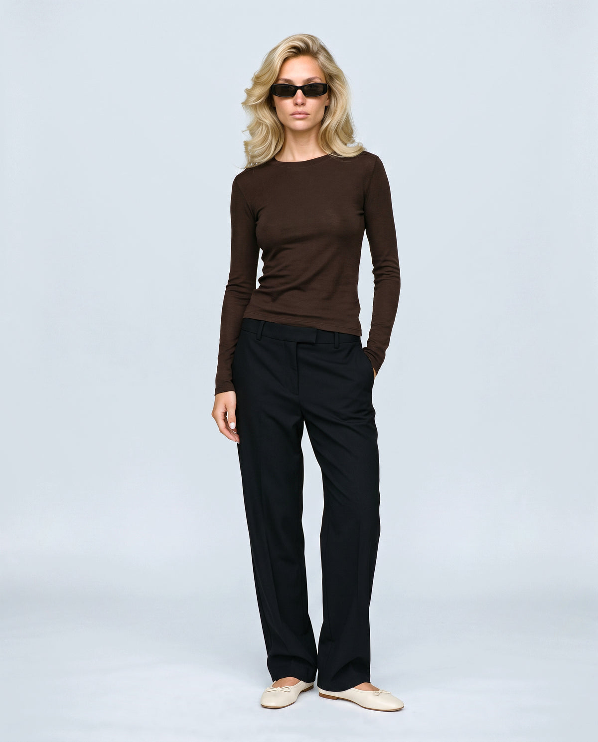 The Fine-Knit Layering Top in Ebony brown, front view on a non-pregnant model