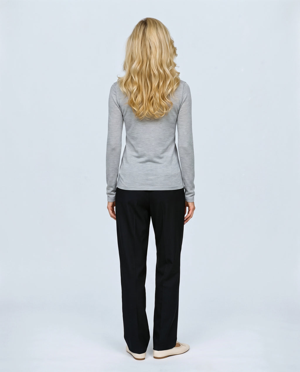 The Fine-Knit Layering Top in Frost grey, back view on a non-pregnant model