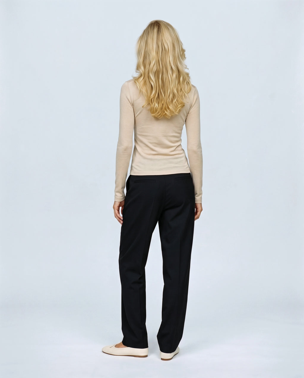 The Fine-Knit Layering Top in Linen beige, back view on a non-pregnant model