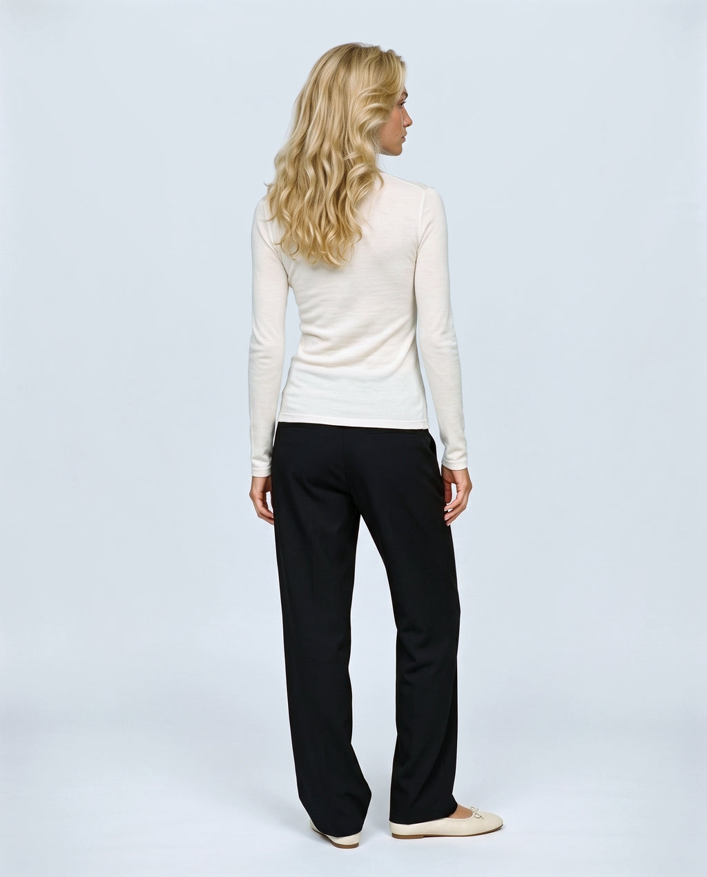 The Fine-Knit Layering Top in Off-white, back view on a non-pregnant model