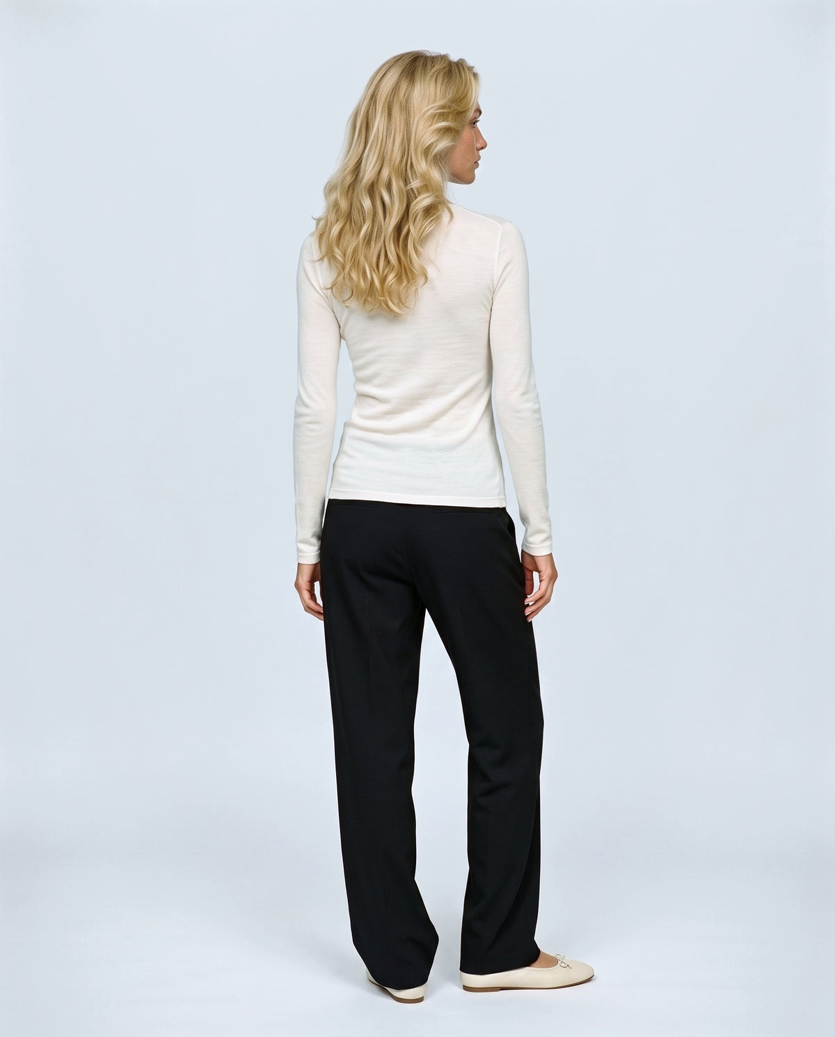 The Fine-Knit Layering Top in Off-white, back view on a non-pregnant model