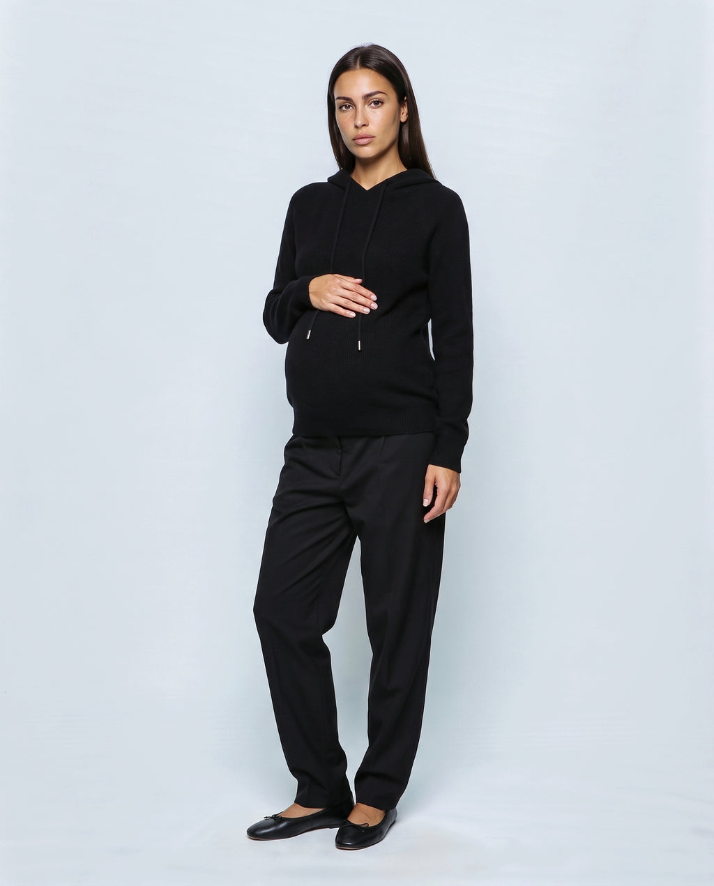 The Relaxed Knit Hoodie in Black, front view