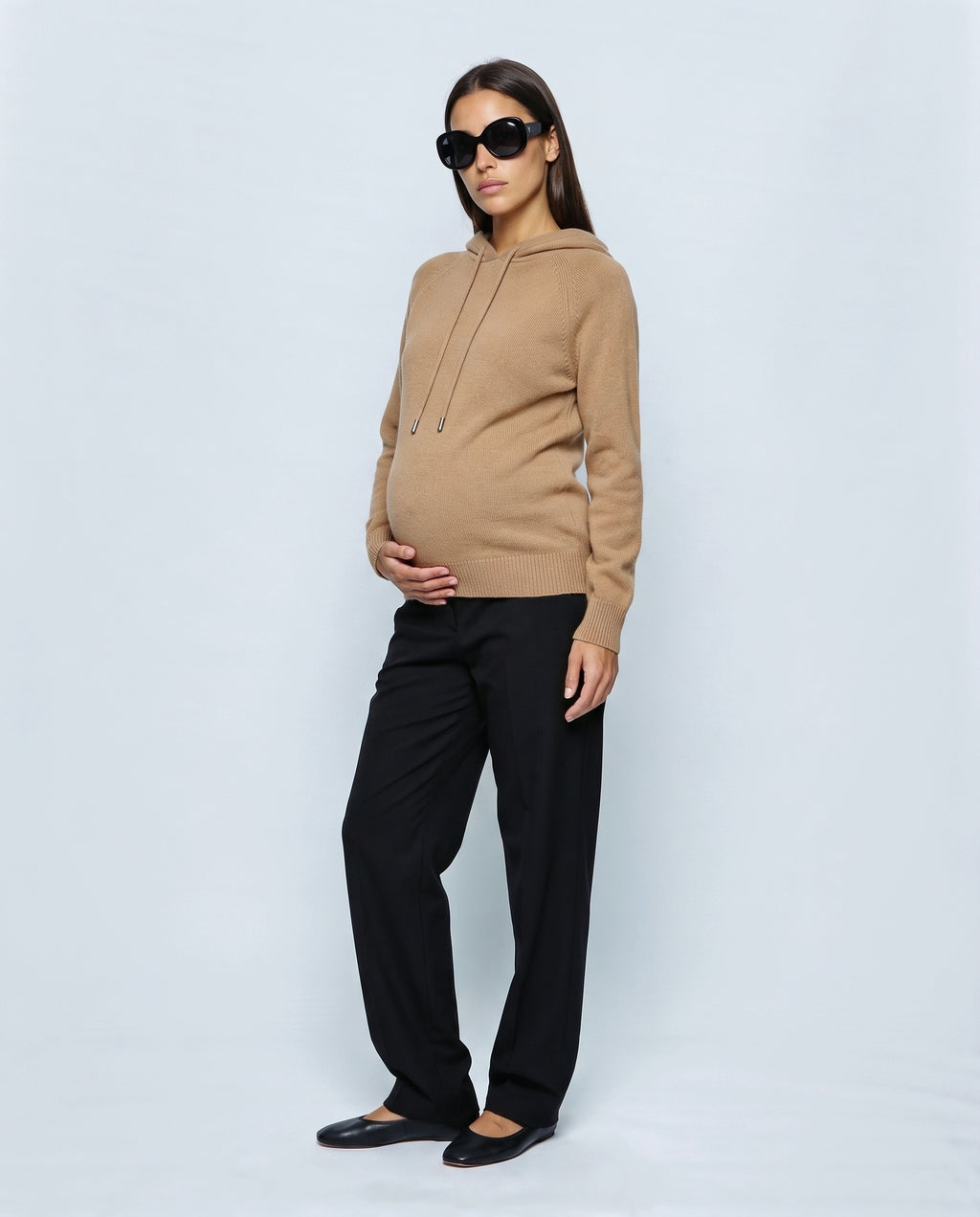 The Relaxed Knit Hoodie in Camel, side view