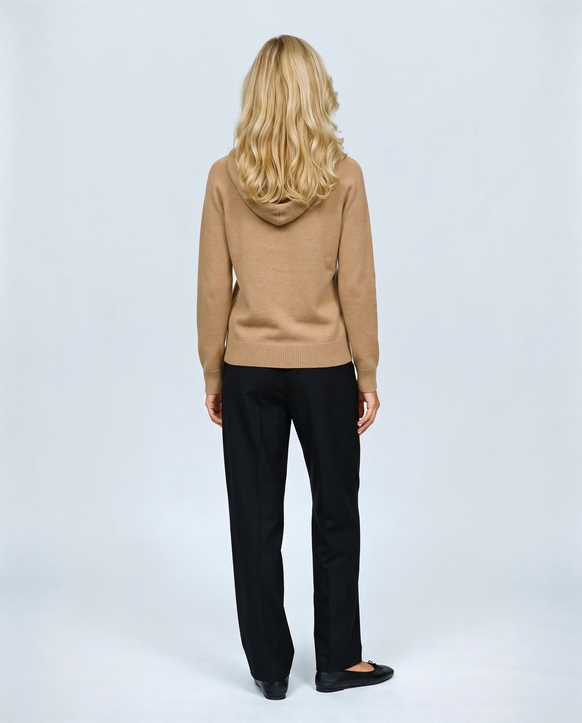 The Relaxed Knit Hoodie in Camel, back view on a non-pregnant model