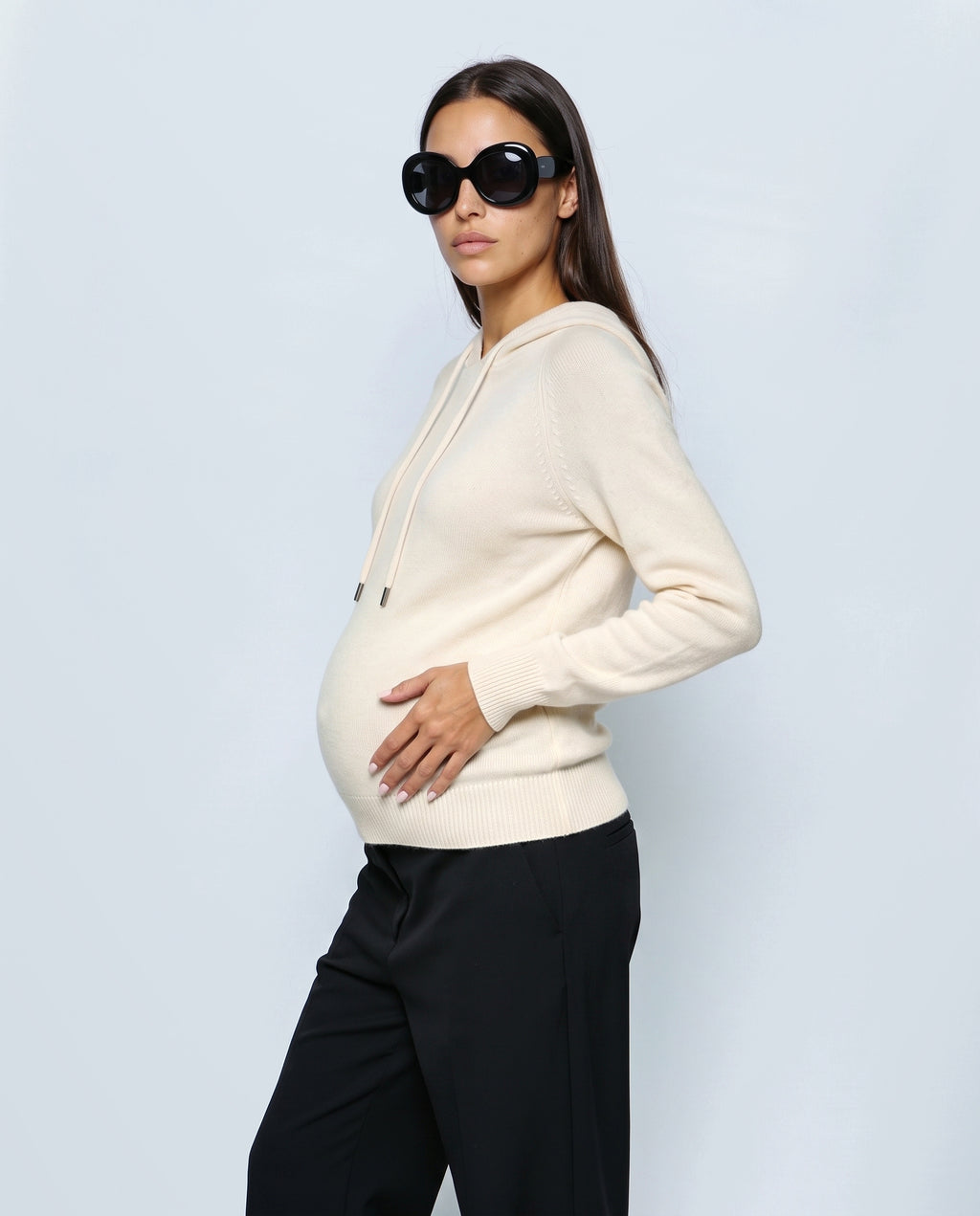 The Relaxed Knit Hoodie in Cream, side view