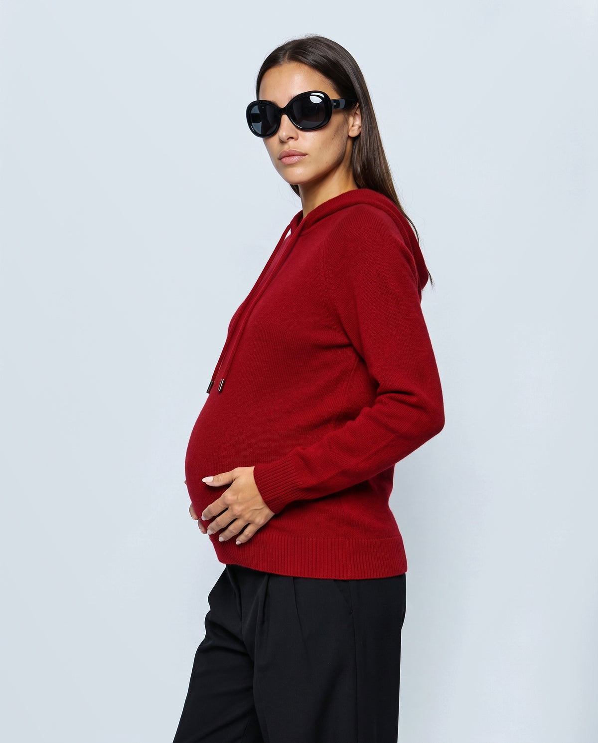 The Relaxed Knit Hoodie in Red, side view