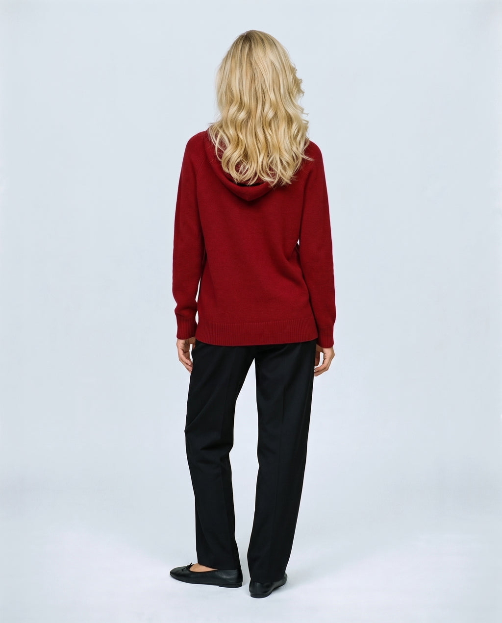 The Relaxed Knit Hoodie in Red, back view on a non-pregnant model
