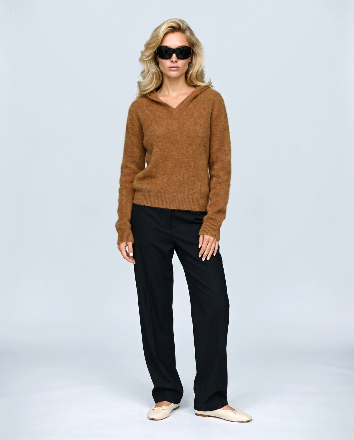 The Soft-Touch Knit Hoodie in Caramel, front view on a non-pregnant model